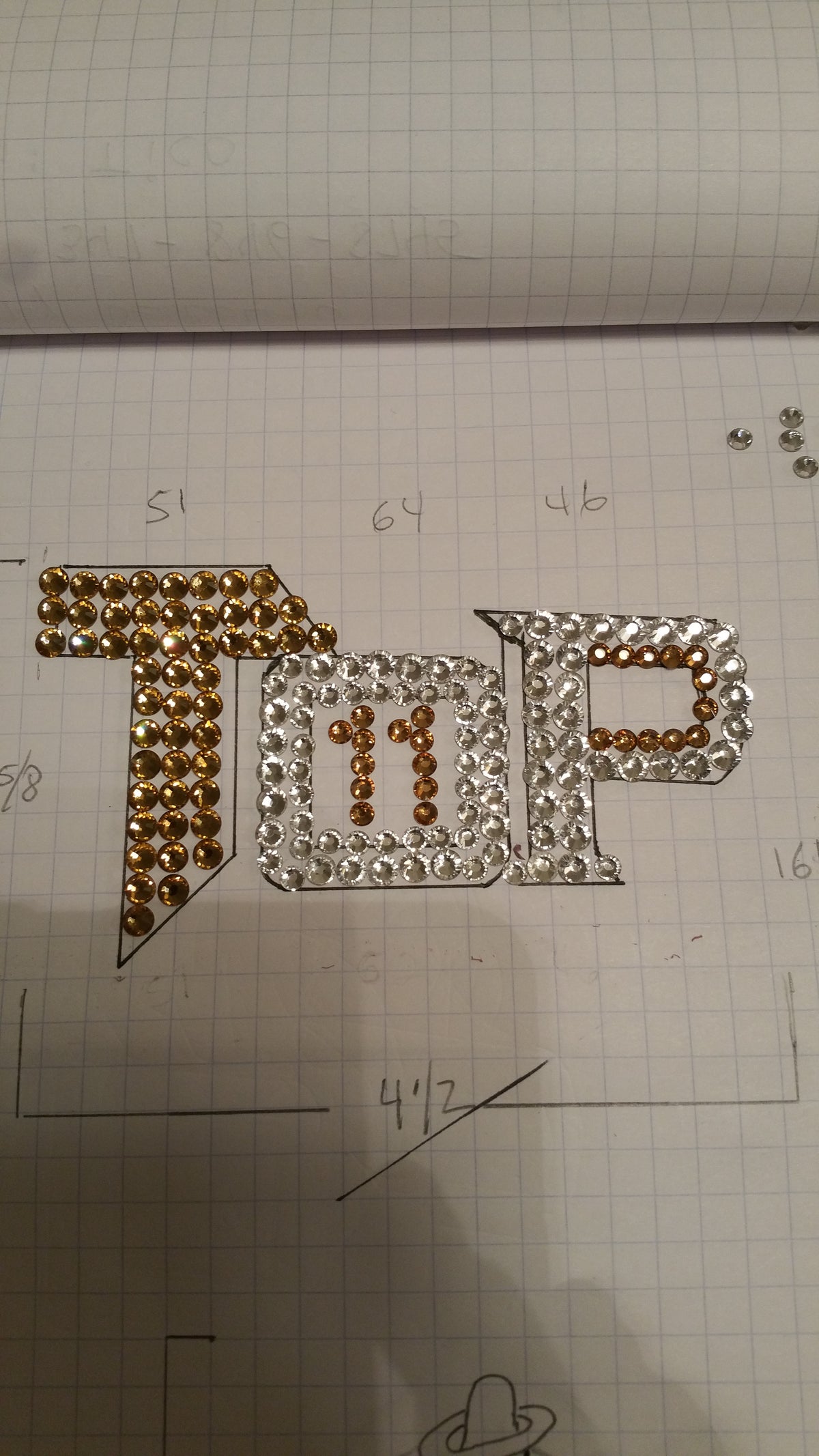 Early hand-set rhinestone design by Truco Fashion